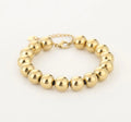 Kralen armband 10mm goud